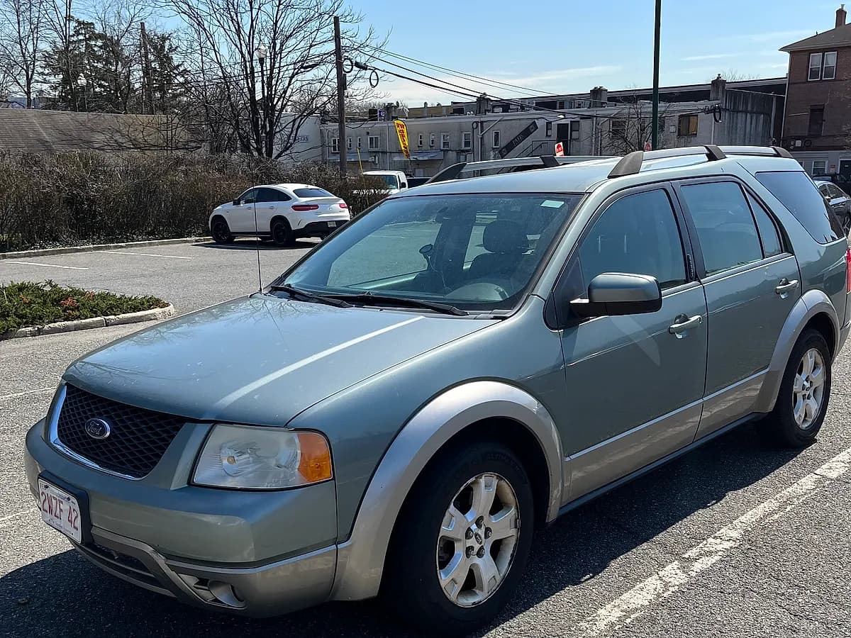 Green 2006 Ford Freestyle SEL wagon we bought for cash in a parking lot