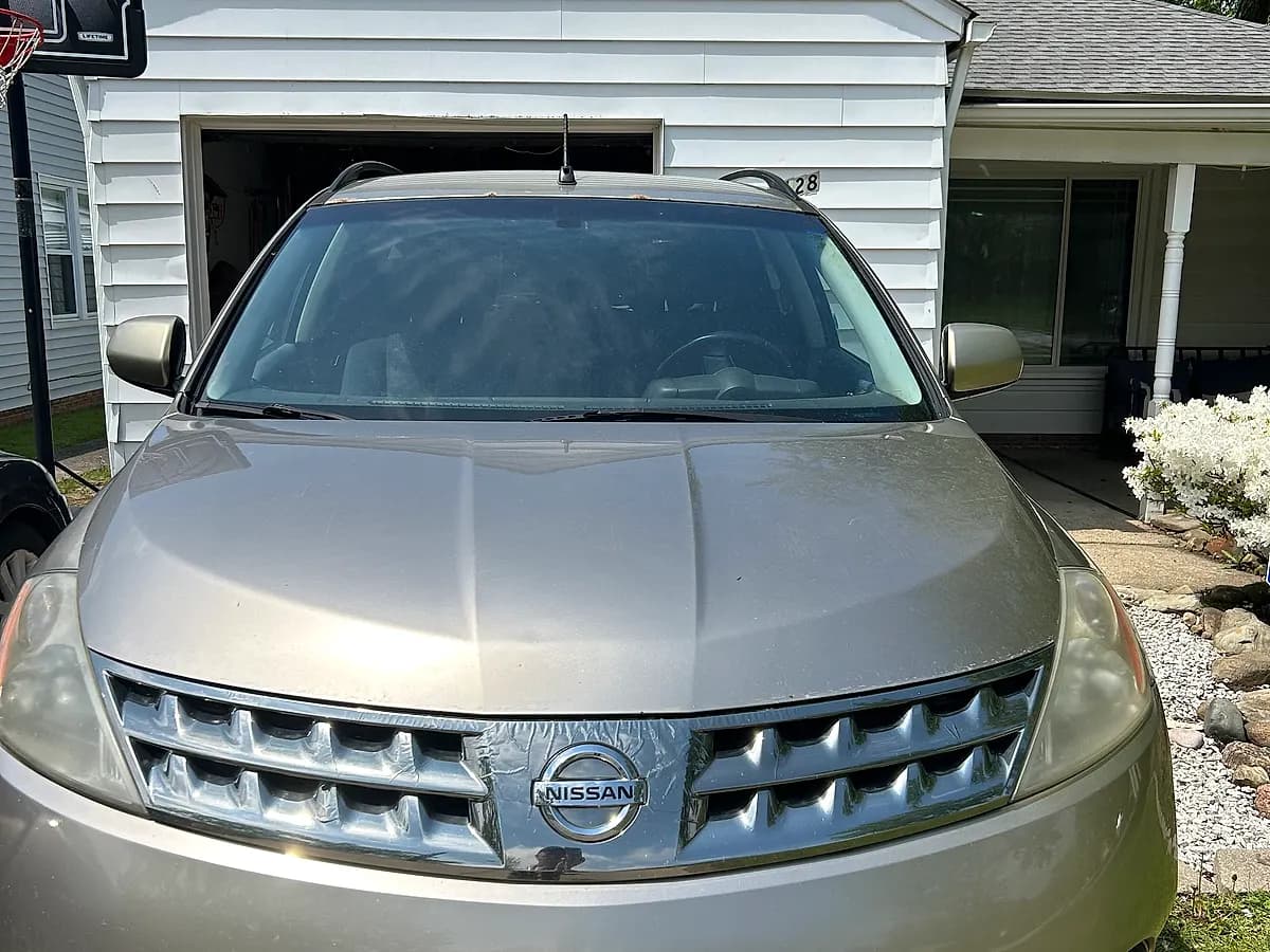 Gold 2007 Nissan Murano SV with faded headlights we bought for cash
