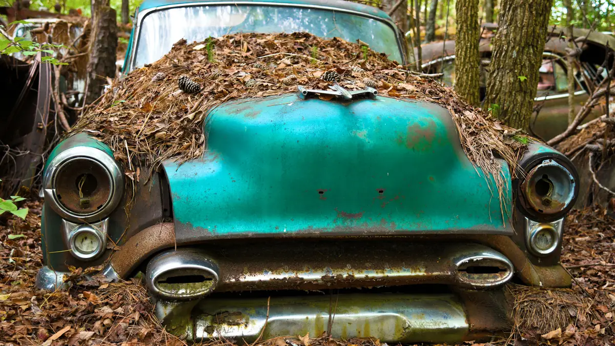An old scrap car awaiting disposal