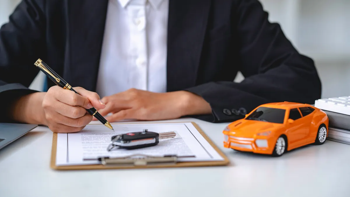 Car keys handed back after vehicle paperwork is processed