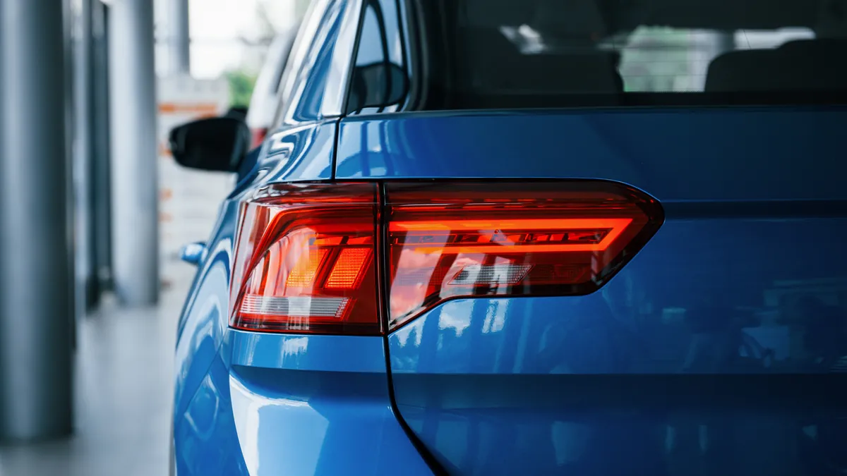 The rear of a car where identifying plates are fitted